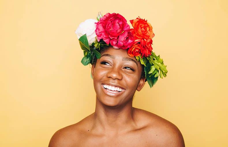 a woman with flowers in her head